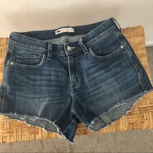 levi’s med wash cut off mid rise shorts